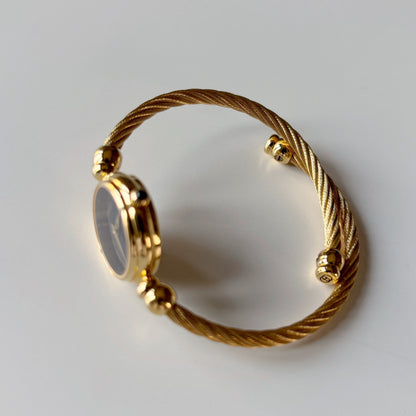 Gucci 1990s Black Dial Gold Plated Cable Bangle Watch