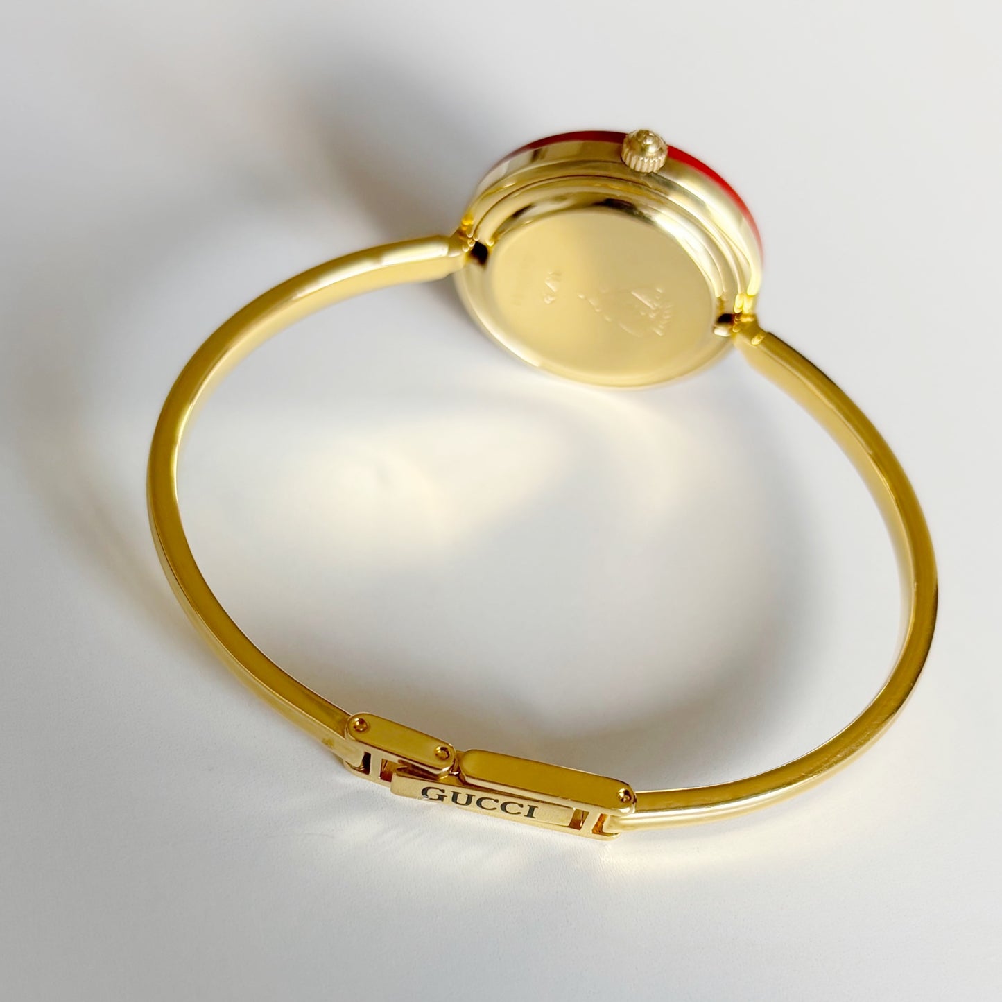 Gucci 1990s Interchangeable Bezel Gold Plated Bangle Watch with 12 bezels, case
