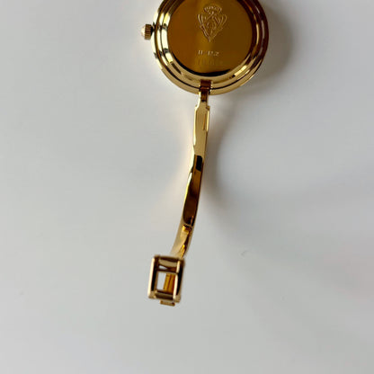 Gucci 1990s Interchangeable Bezel Gold Plated Bangle Watch with case, 12 bezels (Small)