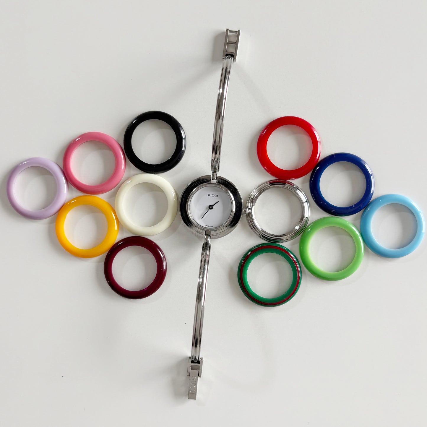 Gucci 1990s Interchangeable Bezel Stainless steel Bangle Watch with 12 bezels, case