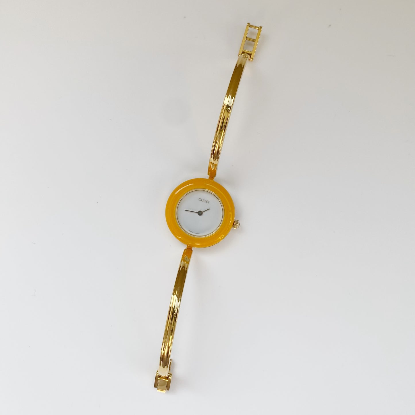 Gucci 1990s Interchangeable Bezel Gold Plated Bangle Watch with 12 bezels, case