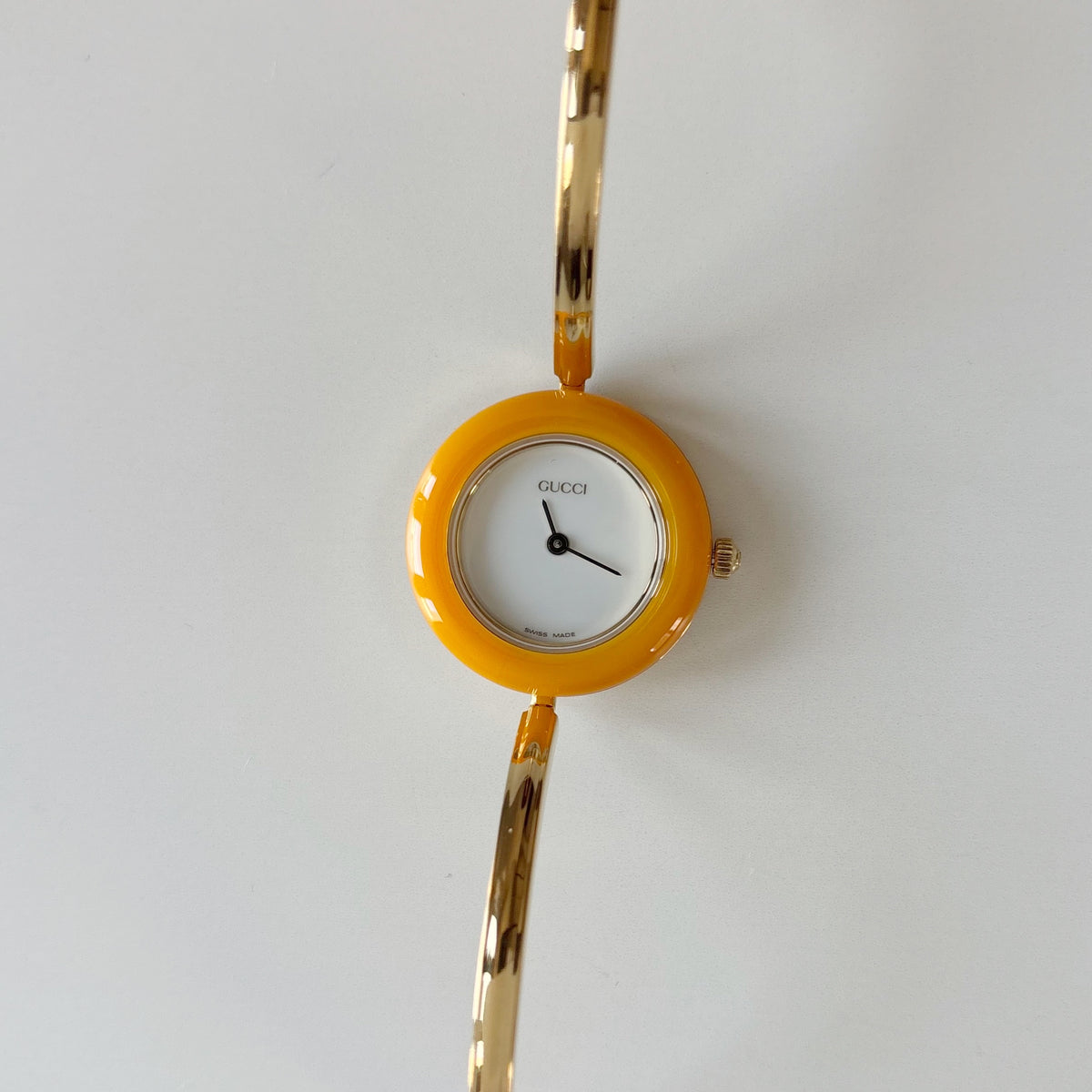 Gucci 1990s Interchangeable Bezel Gold Plated Bangle Watch with 12 bezels, case
