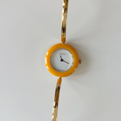 Gucci 1990s Interchangeable Bezel Gold Plated Bangle Watch with 12 bezels, case