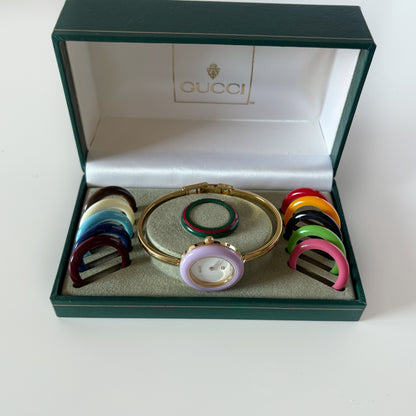 Gucci 1990s Interchangeable Bezel Gold Plated Bangle Watch with 12 bezels, case