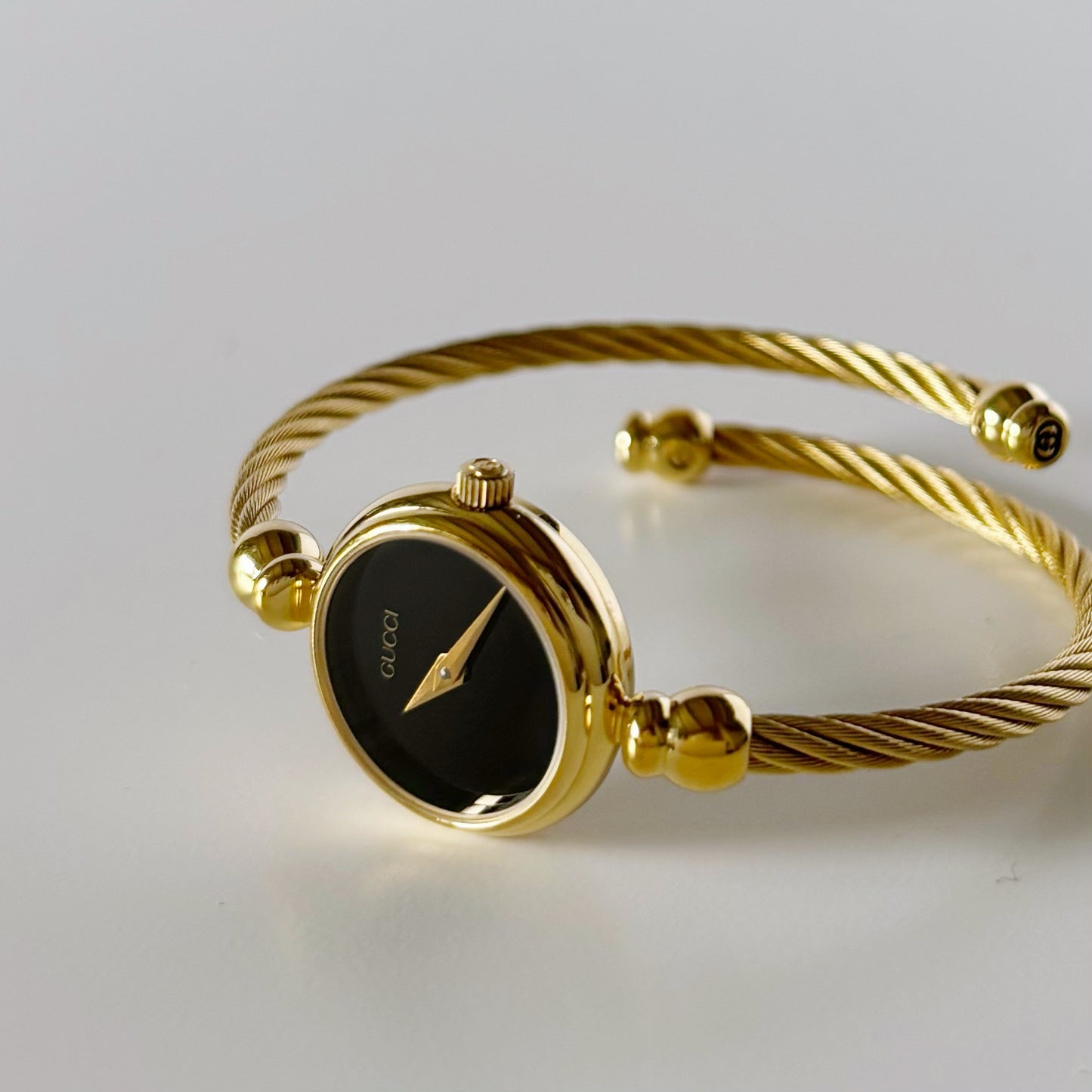 Gucci 1990s Black Dial Gold Plated Cable Bangle Watch