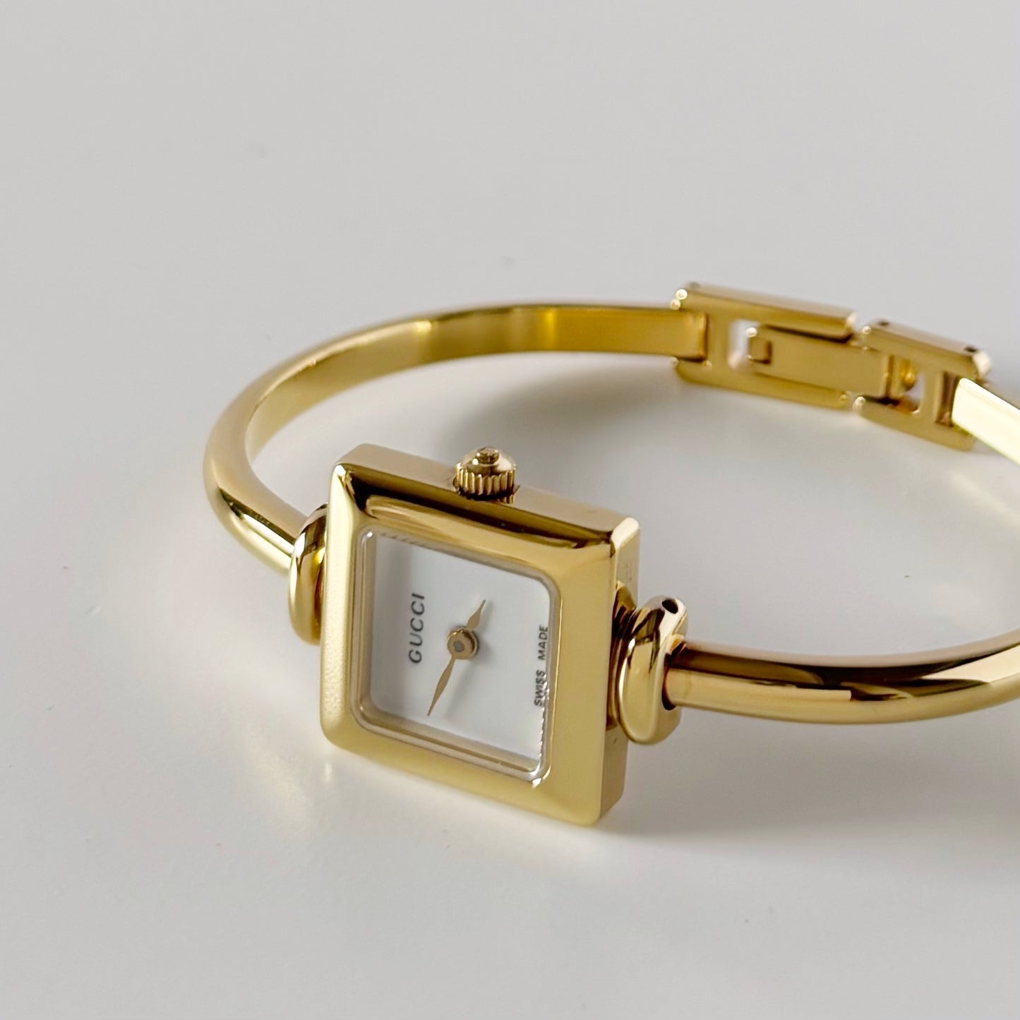 Gucci 1990s Square Dial Gold Plated Bangle Watch