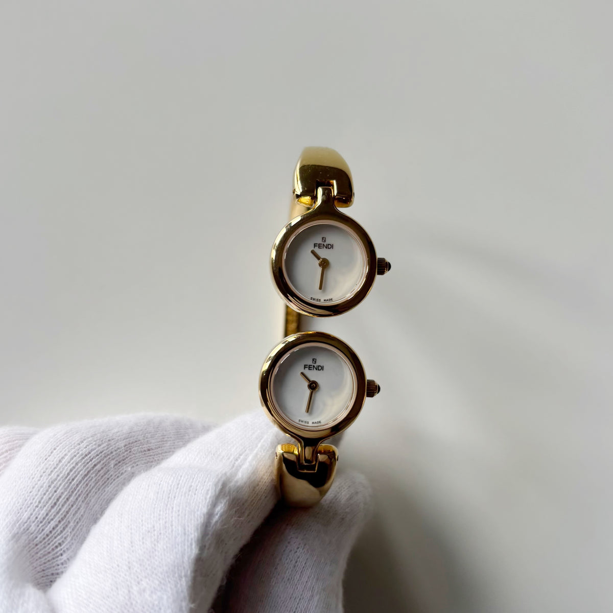 Fendi 1990s Seashell Dial Two Time Zone Gold Plated Bangle Watch