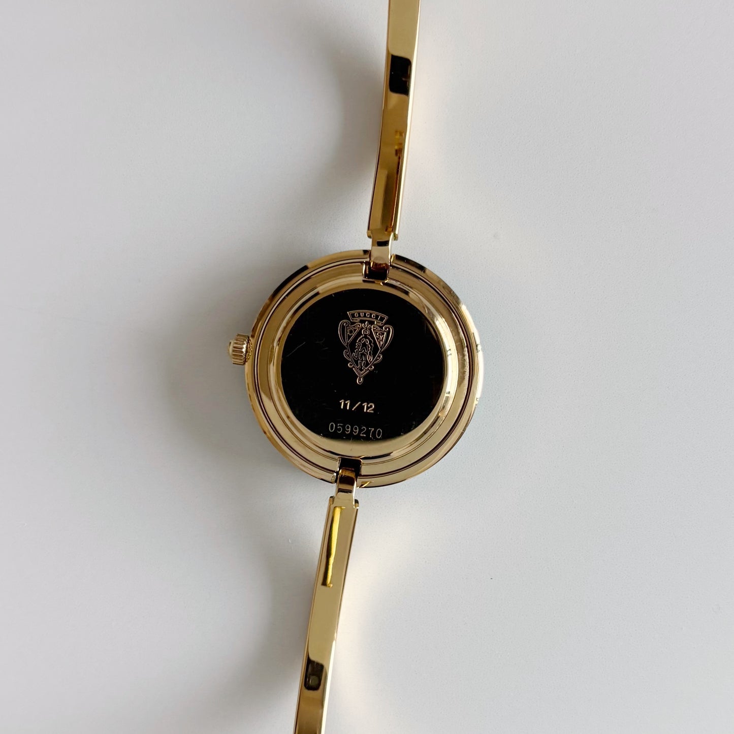 Gucci 1990s Interchangeable Bezel Gold Plated Bangle Watch with 12 bezels, case