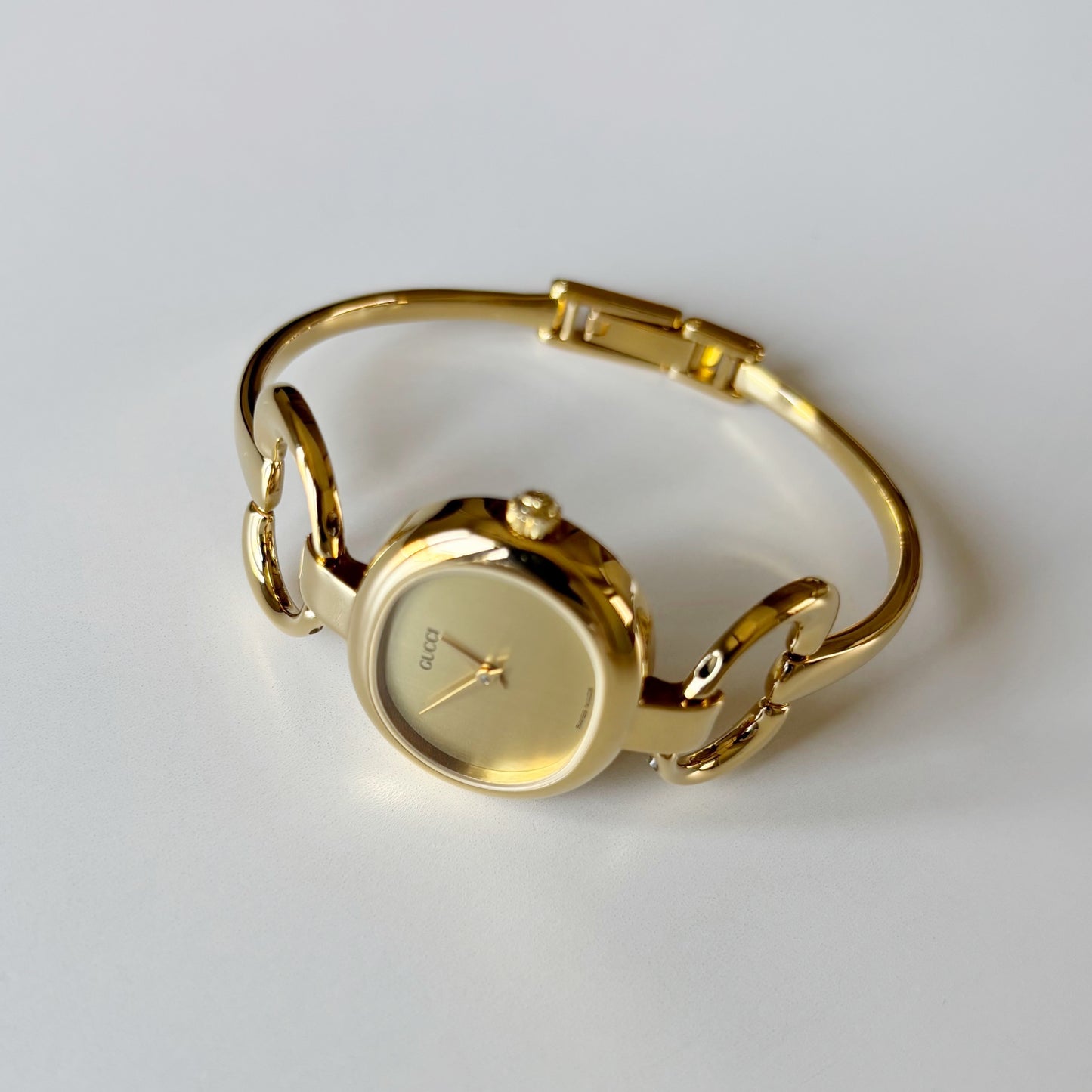 Gucci 1990s Oval Dial Gold Plated Bangle Watch