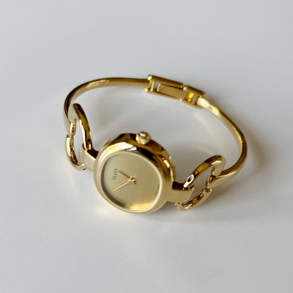 Gucci 1990s Oval Dial Gold Plated Bangle Watch