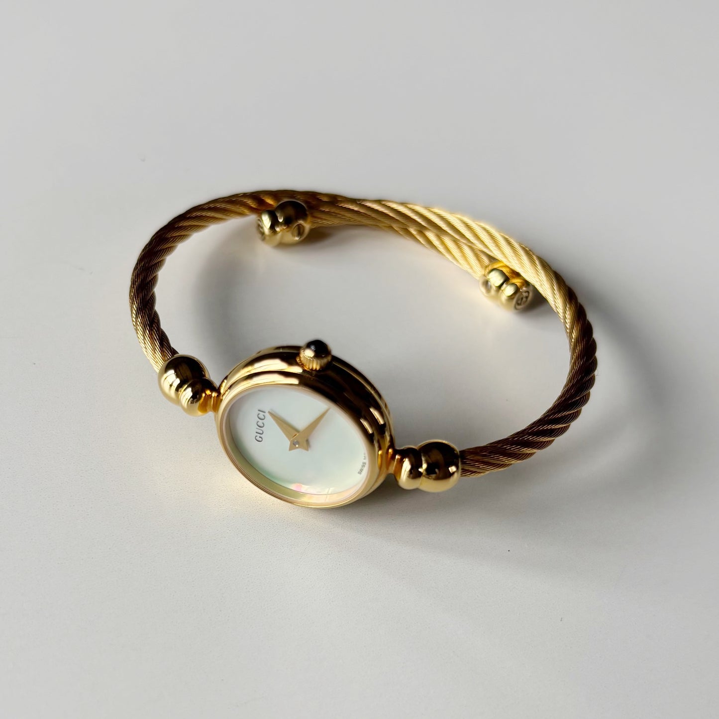 Gucci 1990s Seashell Dial Gold Plated Cable Bangle Watch