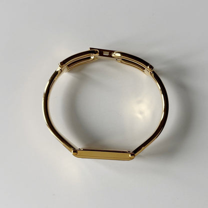 Gucci 1990s Seashell Dial Rectangular Gold-Plated Bangle Watch