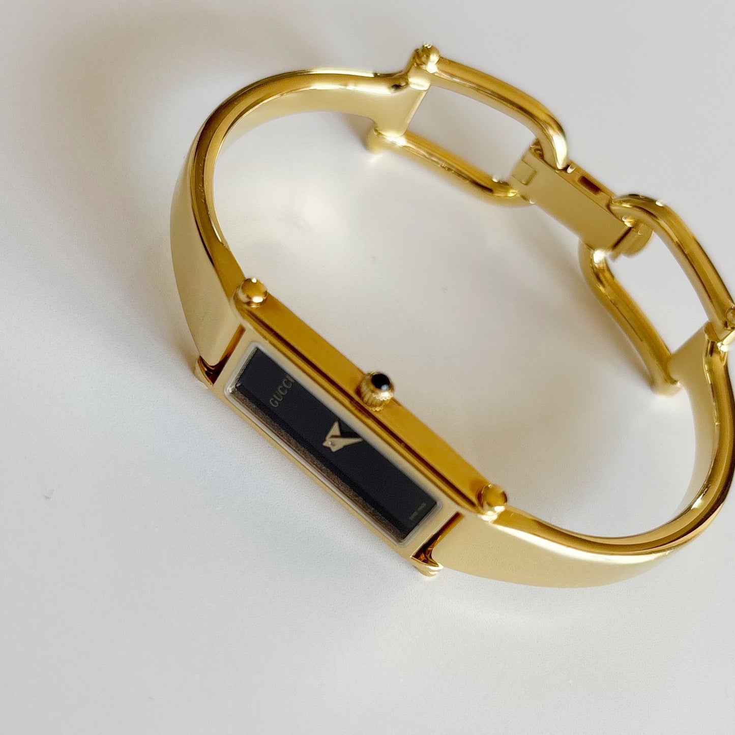 Gucci 1990s Black Dial Gold Plated Bangle Watch