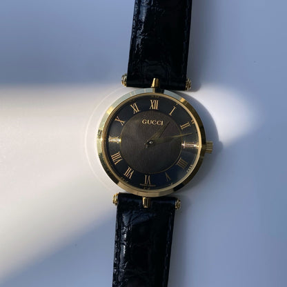 Gucci 1990s Black Dial Gold Plated Black Leather Watch