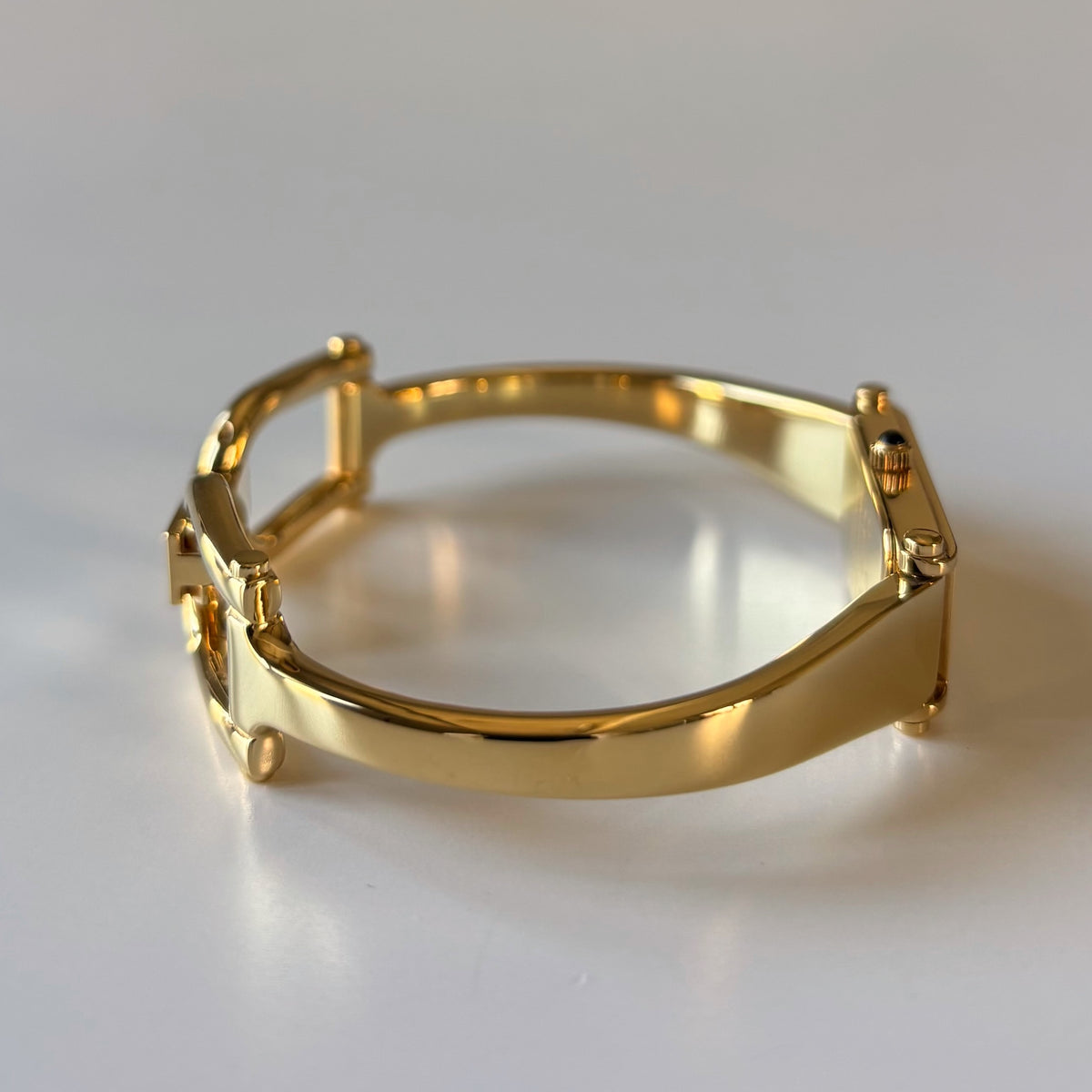 Gucci 1990s Rectangular Gold Dial Gold-Plated Watch