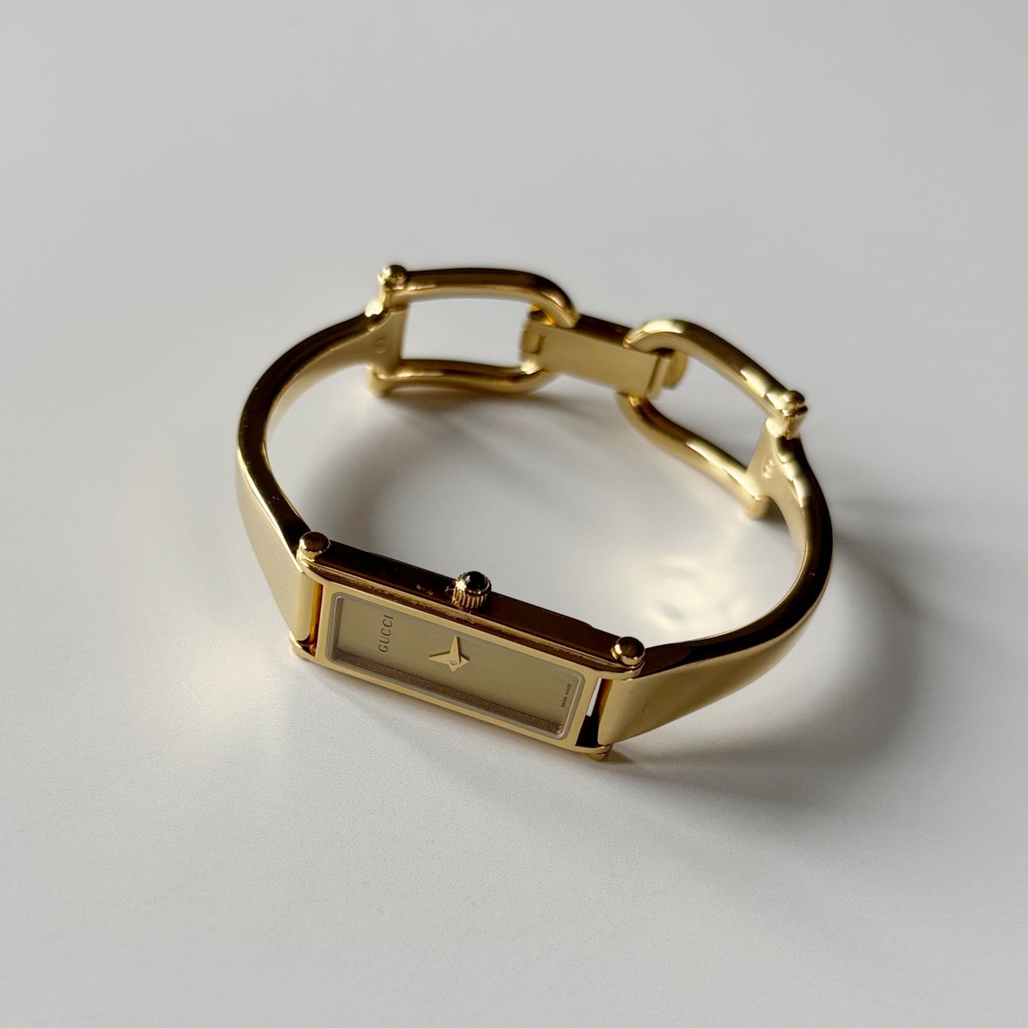 Gucci 1990s Gold Rectangular Dial Gold Plated Bangle Watch (Small)