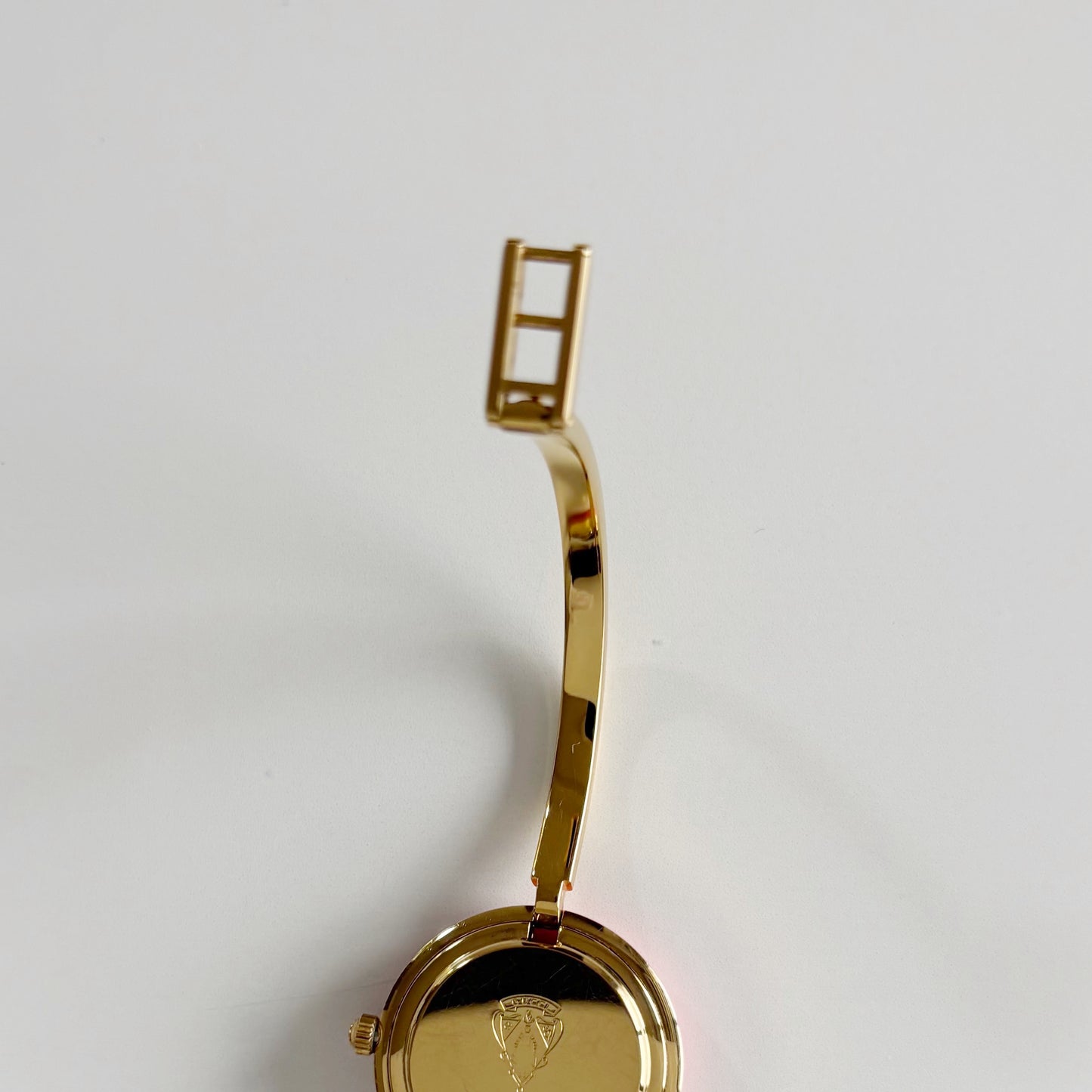 Gucci 1990s Interchangeable Bezel Gold Plated Bangle Watch with 12 bezels, case (Small)