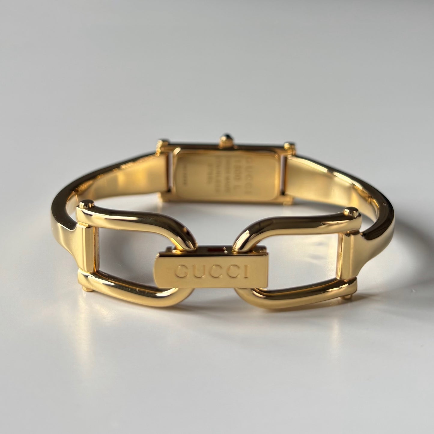 Gucci 1990s Gold Rectangular Dial Gold Plated Bangle Watch