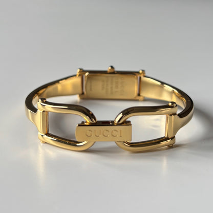 Gucci 1990s Gold Rectangular Dial Gold Plated Bangle Watch