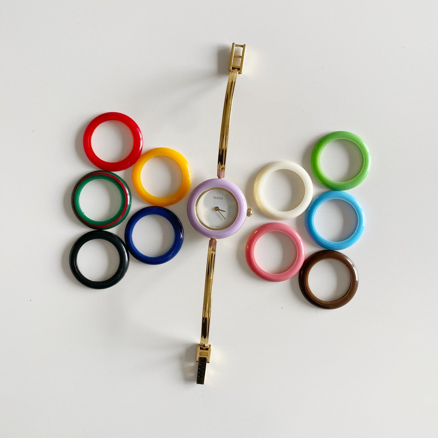 Gucci 1990s Interchangeable Bezel Gold Plated Bangle Watch with 12 bezels, case