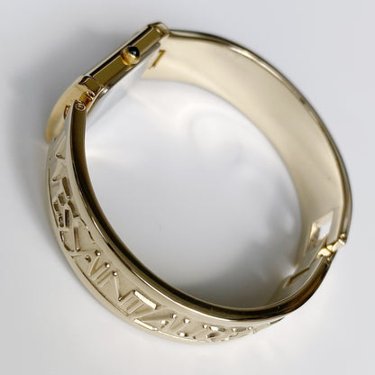 Yves Saint Laurent 1990s Seashell Dial Gold Plated Bangle Watch