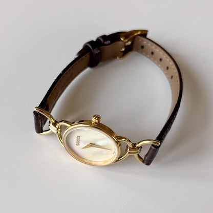 Gucci 1990s Seashell Dial Horsebit Gold Plated Watch