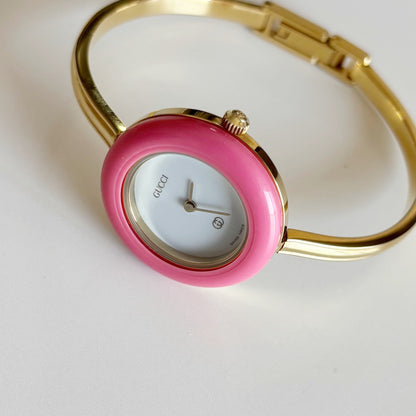 Gucci 1990s Interchangeable Bezel Gold Plated Bangle Watch with 12 bezels, case