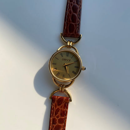 Gucci 1990s Gold Plated Round Dial Horsebit Watch