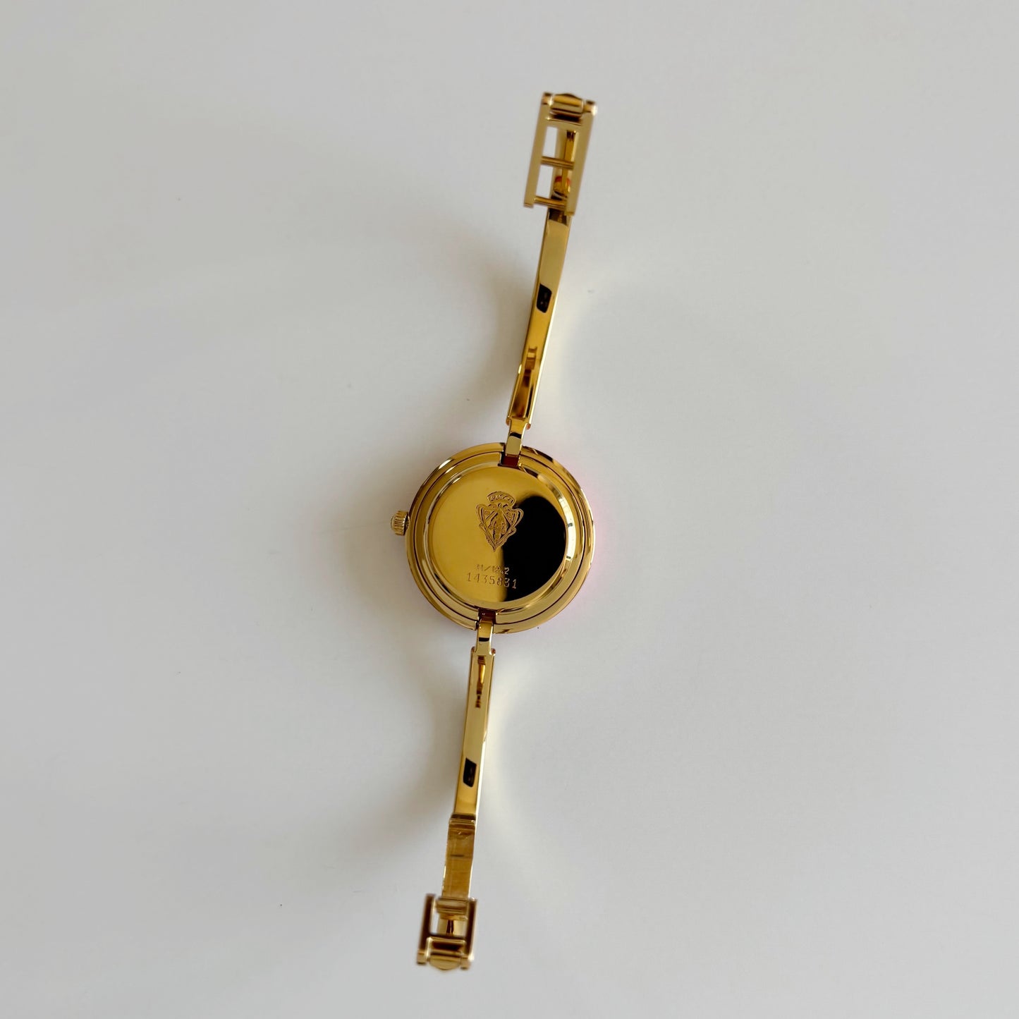 Gucci 1990s Interchangeable Bezel Gold Plated Bangle Watch with 12 bezels, case