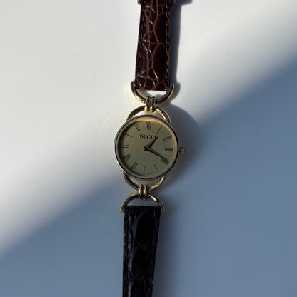 Gucci 1990s Gold Round Dial Horsebit Gold Plated Watch