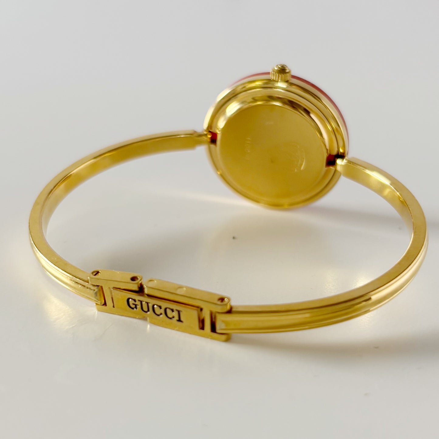 Gucci 1990s Interchangeable Bezel Gold Plated Bangle Watch with 12 bezels, case