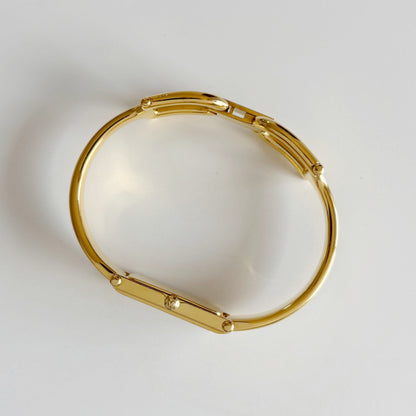 Gucci 1990s Rectangular Seashell Dial Gold Plated Bangle Watch