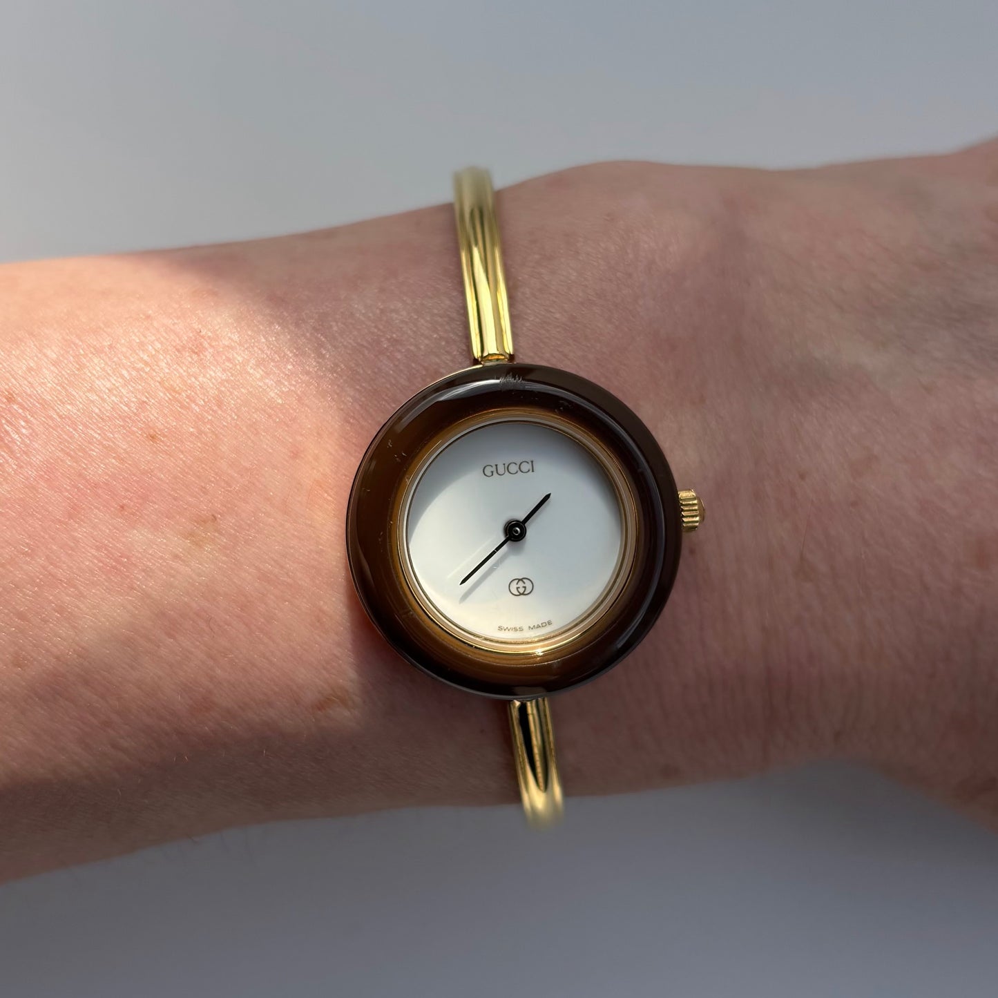 Gucci 1990s Interchangeable Bezel Gold Plated Bangle Watch with 12 bezels, case