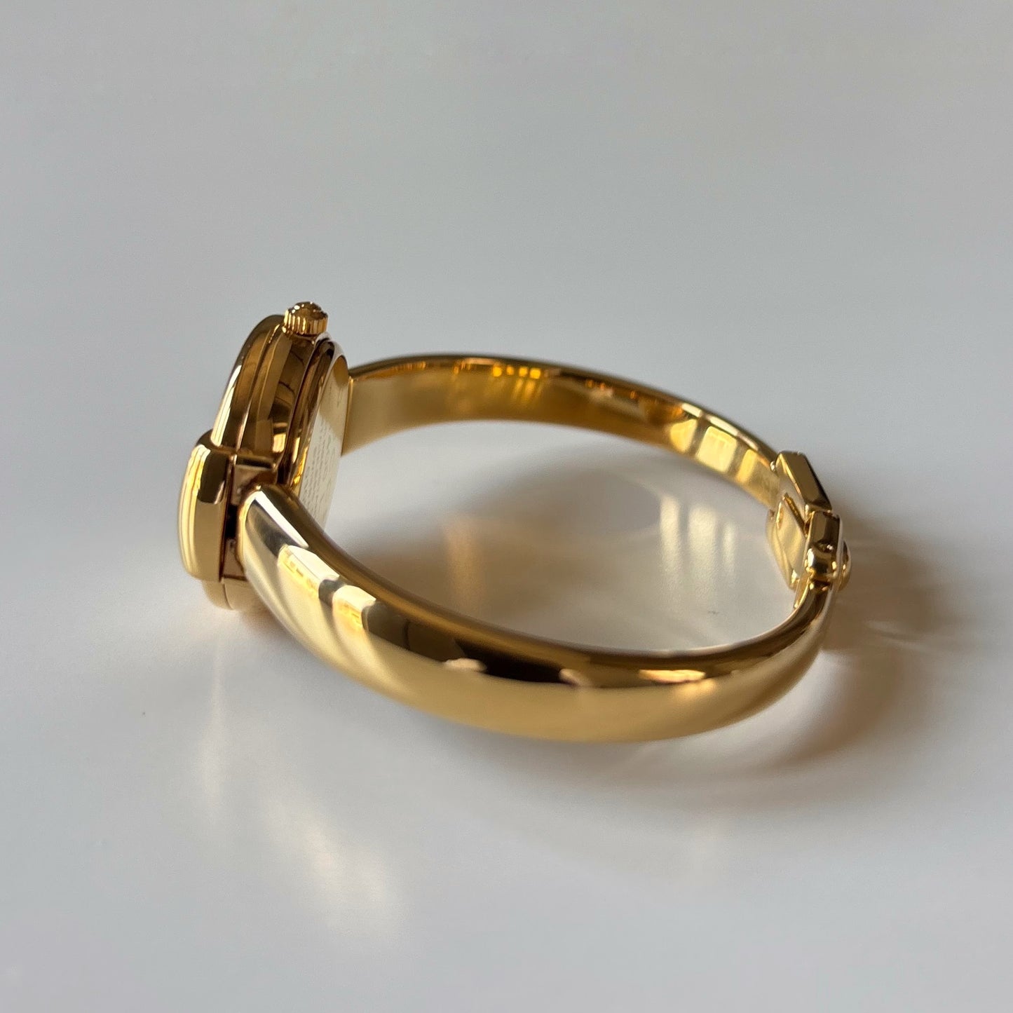 Gucci 1990s Round Dial Gold Plated Bangle Watch