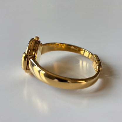 Gucci 1990s Round Dial Gold Plated Bangle Watch