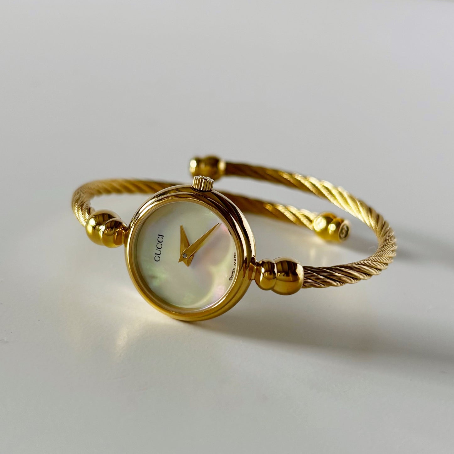 Gucci 1990s Seashell Dial Gold Plated Cable Bangle Watch