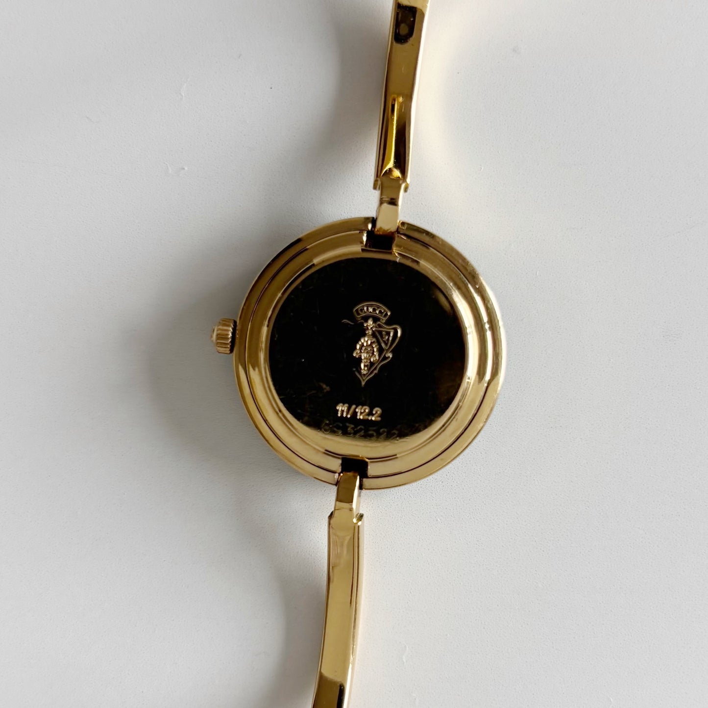 Gucci 1990s Interchangeable Bezel Gold Plated Bangle Watch with 12 bezels, case (Small)