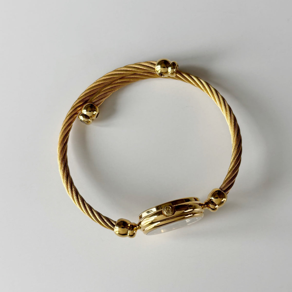 Gucci 1990s Black Round Dial Cable Gold Plated Bangle Watch