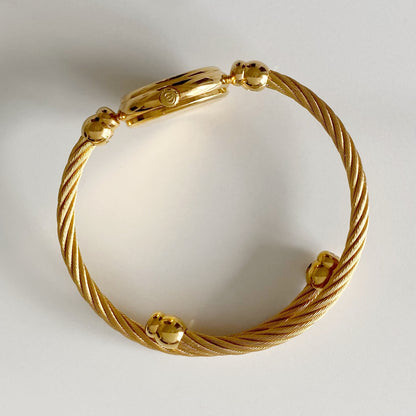 Gucci 1990s Seashell Dial Gold Plated Cable Bangle Watch