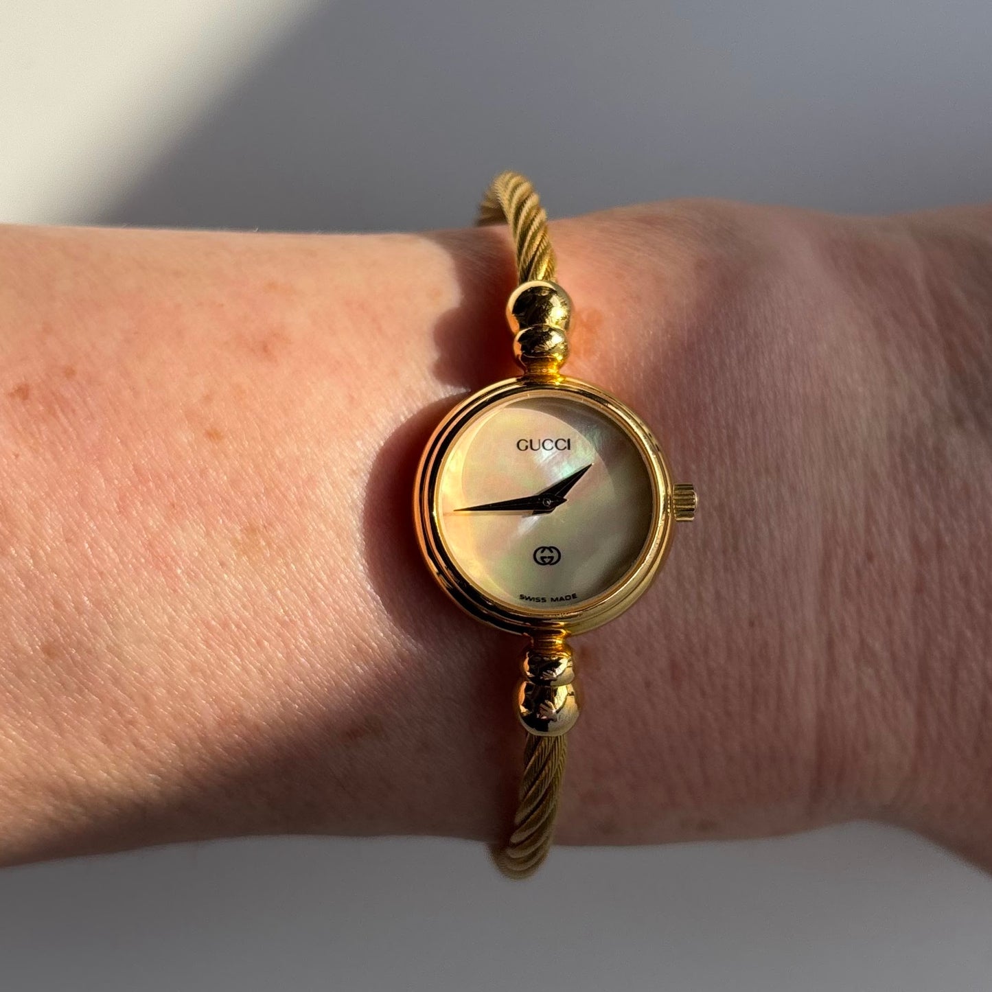 Gucci 1990s Seashell Dial Cable Gold Plated Bangle Watch