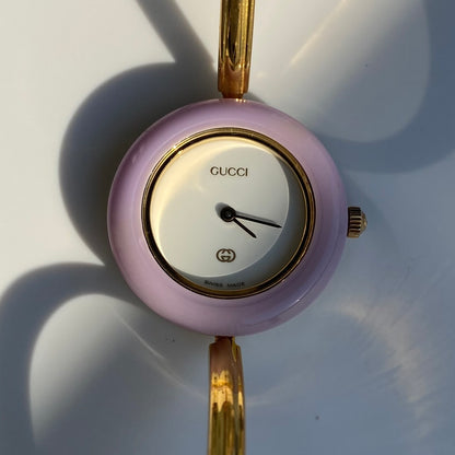 Gucci 1990s Interchangeable Bezel Gold Plated Bangle Watch with 12 bezels, case