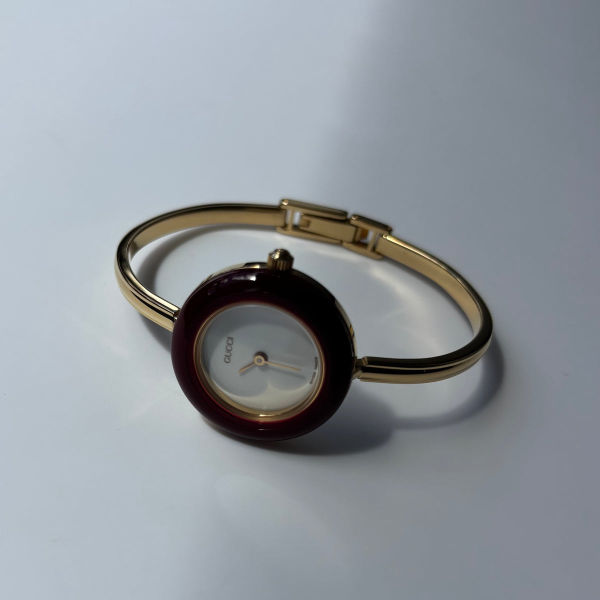 Gucci 1990s Interchangeable Bezel Gold Plated Bangle Watch with 12 bezels, case