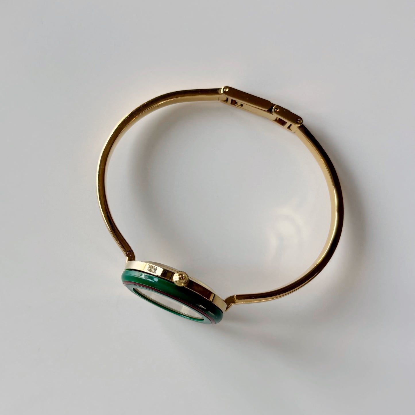 Gucci 1990s Interchangeable Bezel Gold Plated Bangle Watch with 12 bezels, case