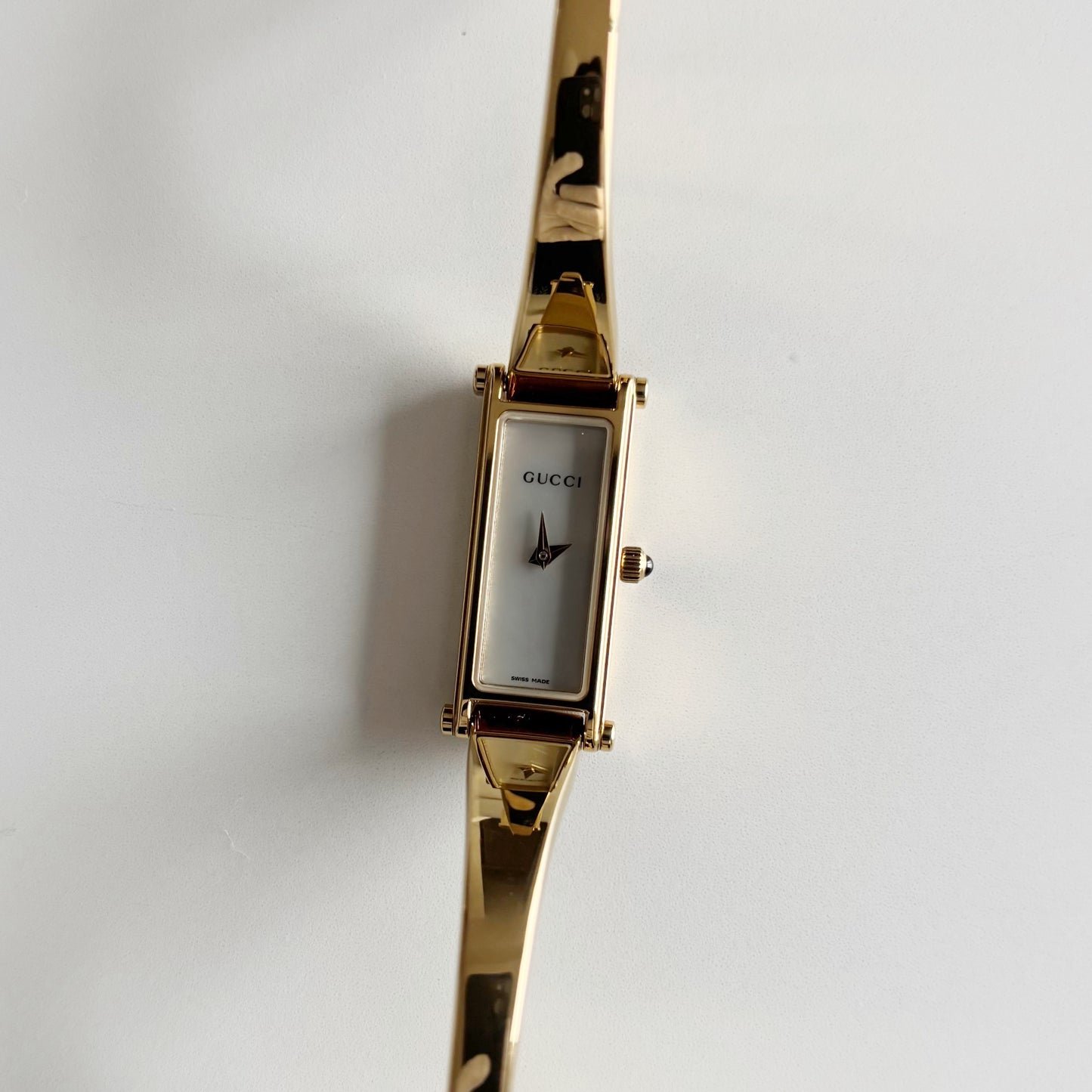 Gucci 1990s Seashell Rectangular Dial Gold Plated Bangle Watch (Small)