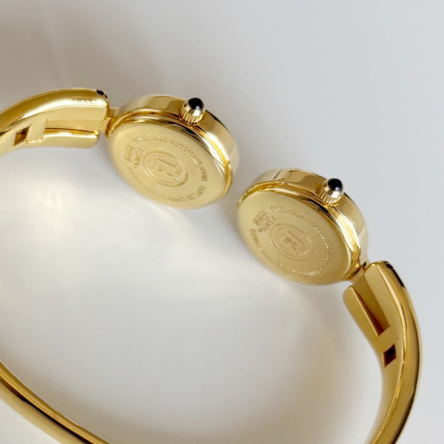 Fendi 1990s Seashell Dial Two Time Zone Gold Plated Bangle Watch