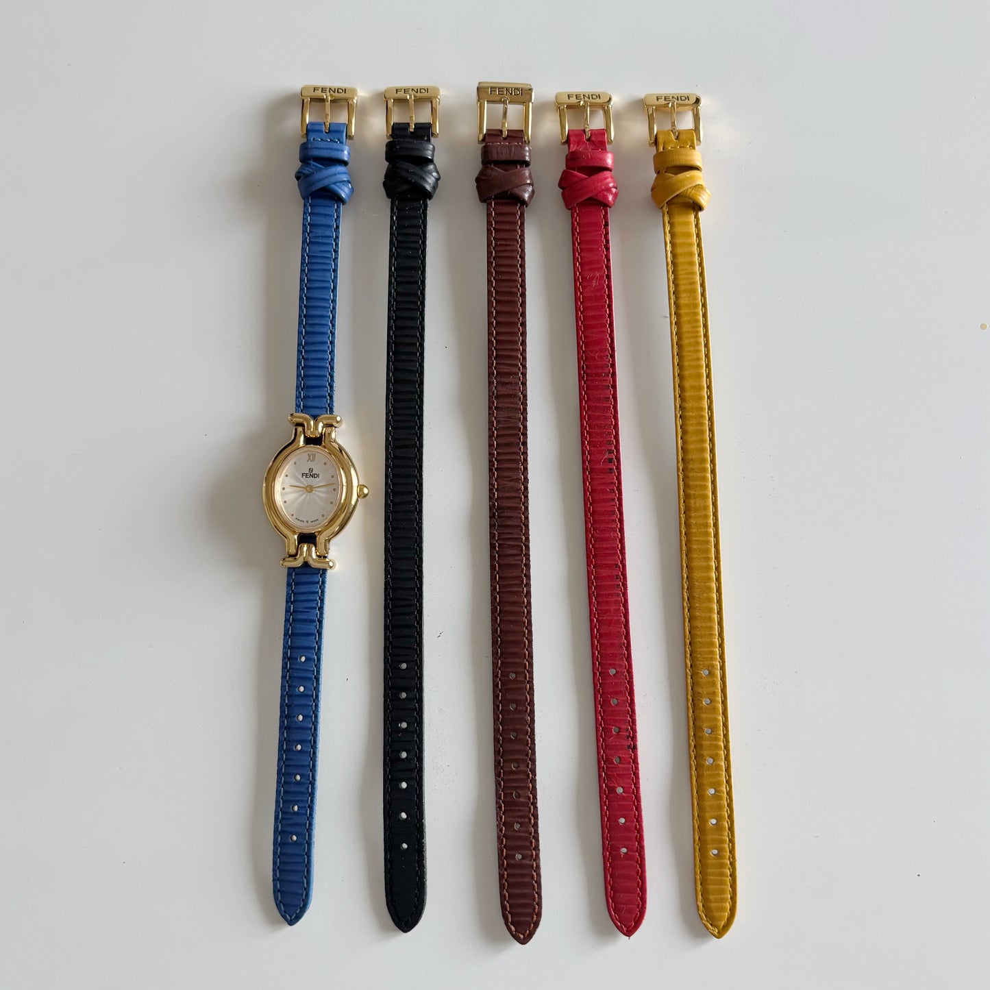 Fendi 1990s Interchangeable Strap Oval Dial Gold Plated Watch with 5 straps, case