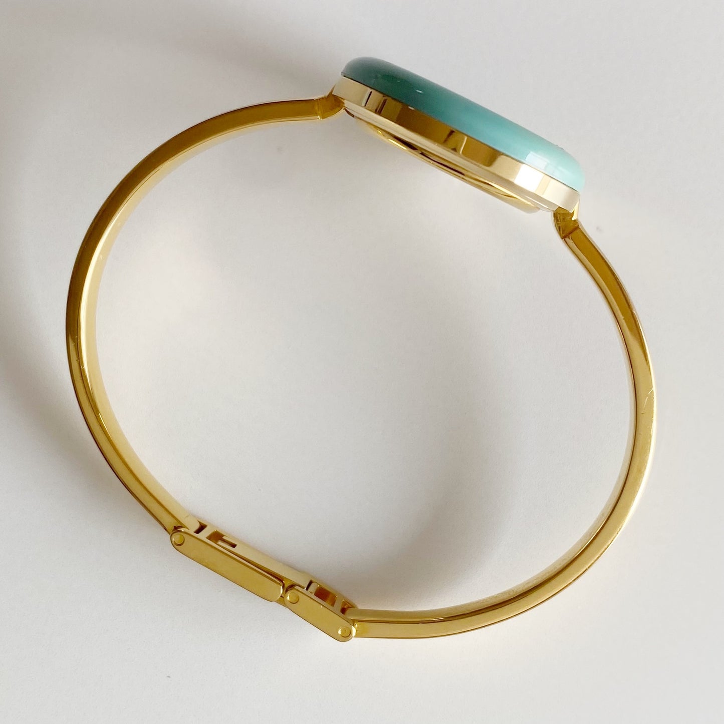 Gucci 1990s Interchangeable Bezel Gold Plated Bangle Watch with 12 bezels, case