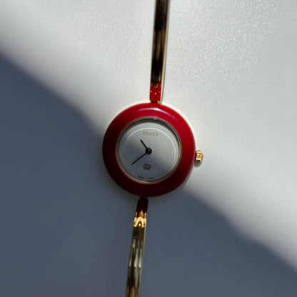 Gucci 1990s Interchangeable Bezel Gold Plated Bangle Watch with 12 bezels, case