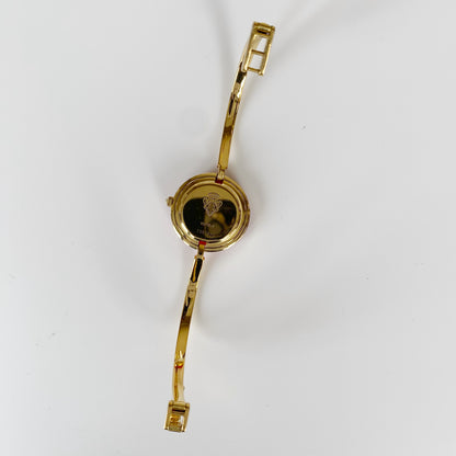 Gucci 1990s Interchangeable Bezel Gold Plated Bangle Watch with 12 bezels, case