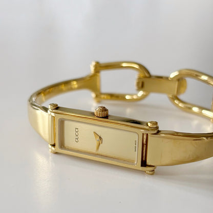 Gucci 1990s Gold Dial Gold Plated Bangle Watch